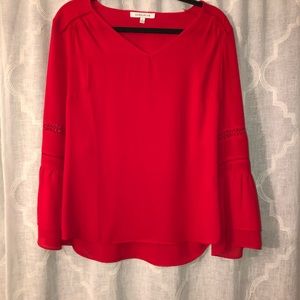 Red bell sleeve v neck blouse